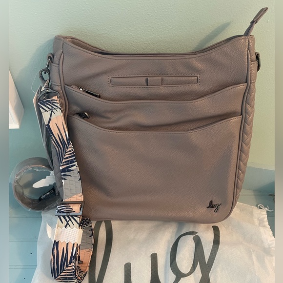 lug Handbags - NWT Lug Cable Car VL Crossbody Bag in Pearl with 2 straps - price is firm.